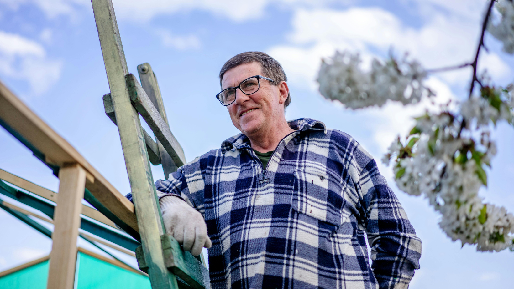 Gentleman smiling proudly after his dental implants